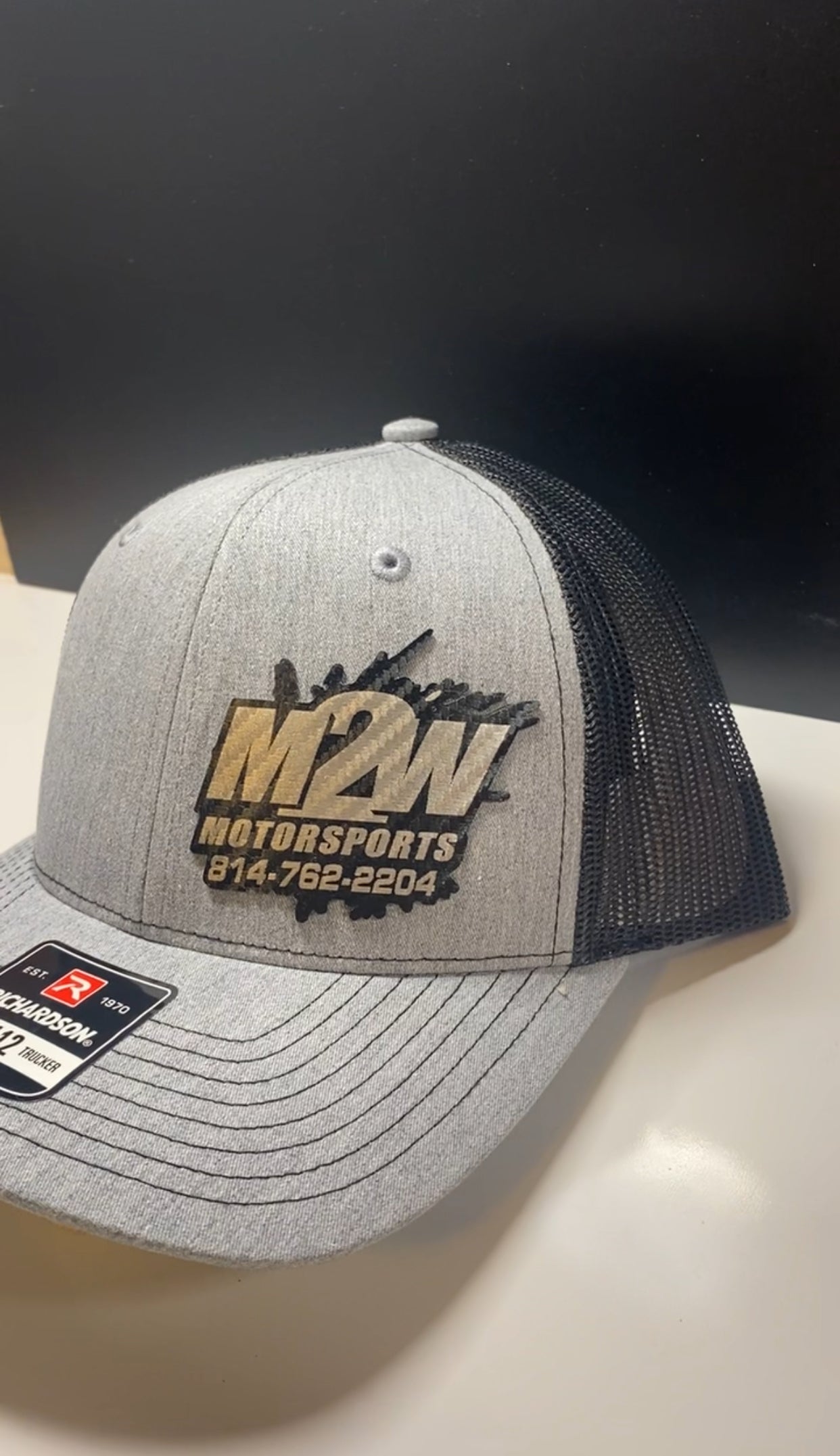 Grey carbon fiber snapback